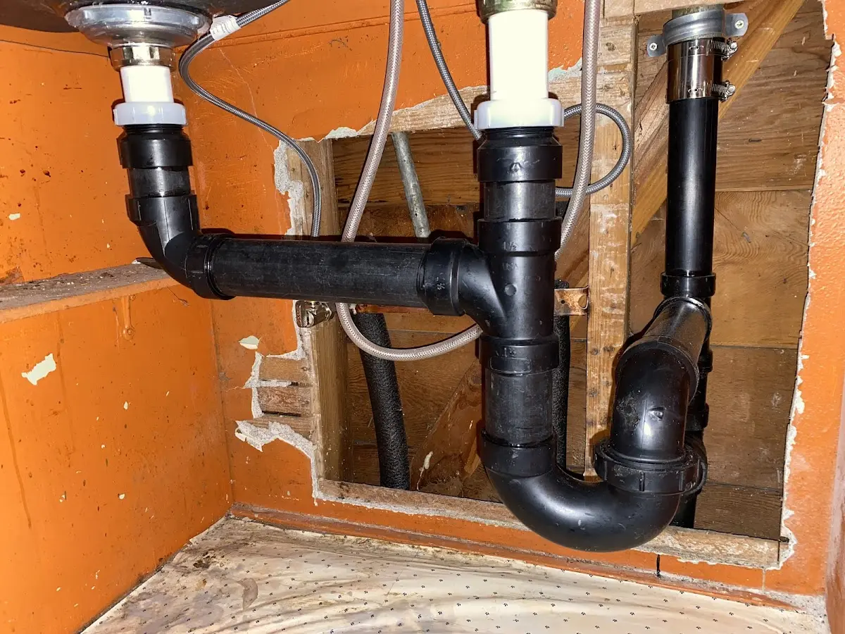 Professional Garbage Disposal Repair equipment and tools on the job in Conway